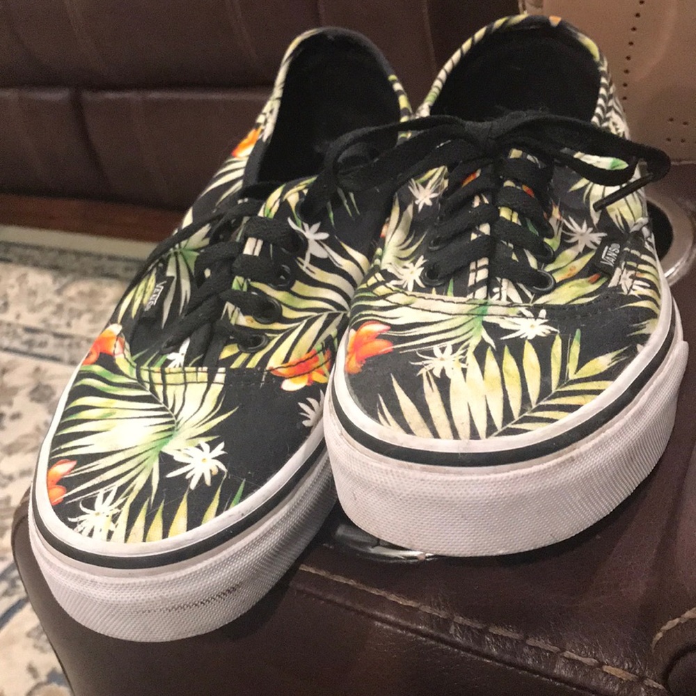 Vans palm with orange flowers